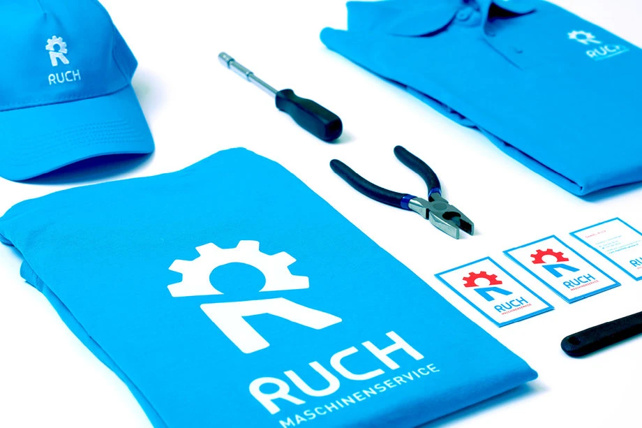 Entwicklung Logo by Lockedesign, Burgdorf: Geschäftsauftritt von Ruch Maschinenservice mit Visitenkarte, Kuvert und Arbeits-Bekleidung